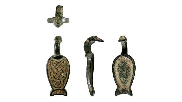 Find, A complete enamelled copper alloy hooked escutcheon from an early Medieval hanging bowl (c.7th century AD).